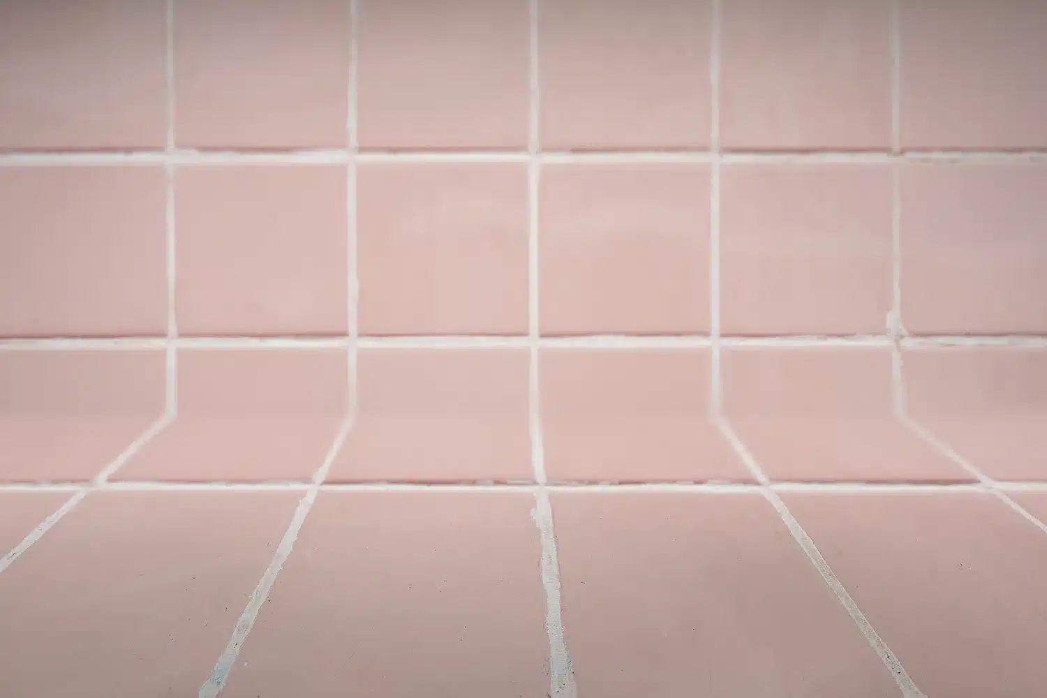 Pink tiles with white grout